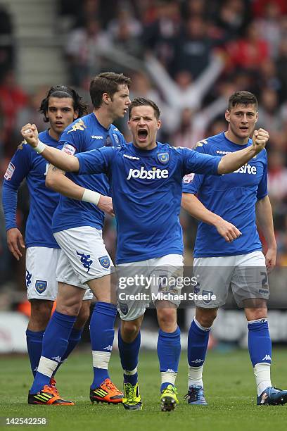 Chris Maguire of Portsmouth celebrates scoring his sides equalising goal during the npower Championship match between Southampton and Portsmouth at...