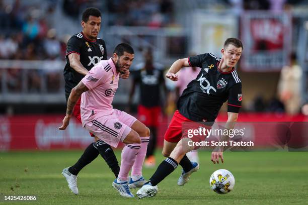 Chris Durkin of D.C. United handles the ball in front of Alejandro Pozuelo of Inter Miami during the first half of the MLS game at Audi Field on...