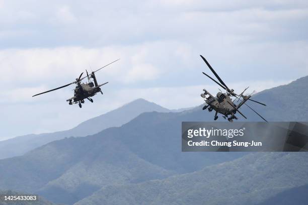 Apachi helicopters hover during the live fire drills as a part of DX Korea 2022 - Defense and Security Expo Korea, on September 20, 2022 in Pocheon,...