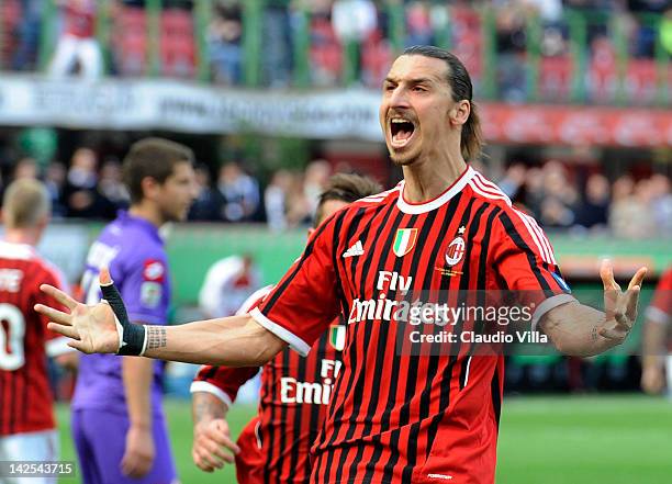 Zlatan Ibrahimovic of AC Milan celebrates after scoring the opening goal from a penalty during the Serie A match between AC Milan and ACF Fiorentina...