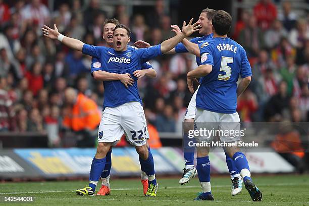 Chris Maguire of Portsmouthcelebrates scoring his sides equalising goal during the npower Championship match between Southampton and Portsmouth at St...