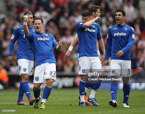 Chris Maguire of Portsmouthcelebrates scoring his sides equalising goal during the npower Championship match between Southampton and Portsmouth at St...
