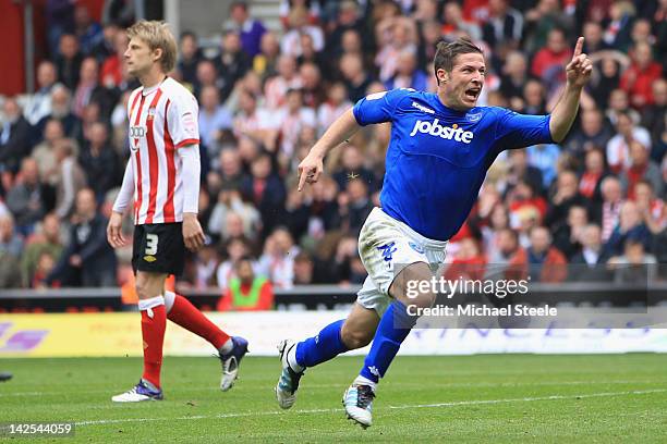 David Norris of Portsmouth celebrates scoring his sides second equalising goal during the npower Championship match between Southampton and...