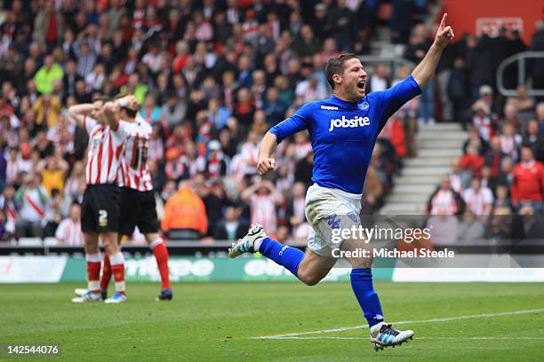 David Norris of Portsmouth celebrates scoring his sides second equalising goal during the npower Championship match between Southampton and...