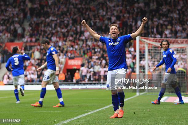 Scott Allan of Portsmouth celebrates in front of the Southampton supporters after the second equalising goal scored by David Norris during the npower...
