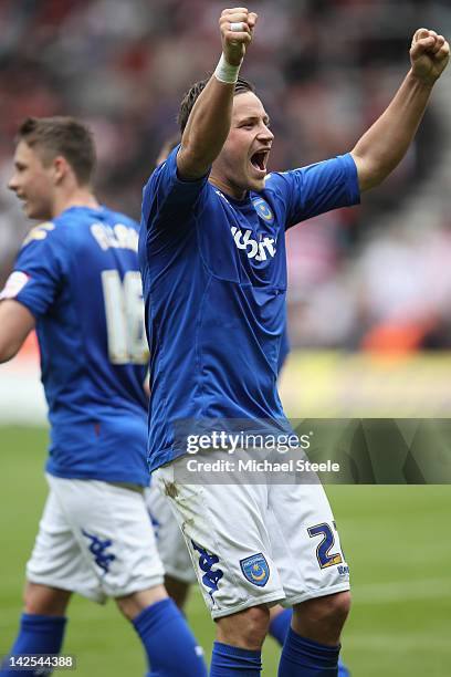 Chris Maguire of Portsmouth celebrates in front of Portsmouth supporters after the second equalising goal scored by David Norris during the npower...