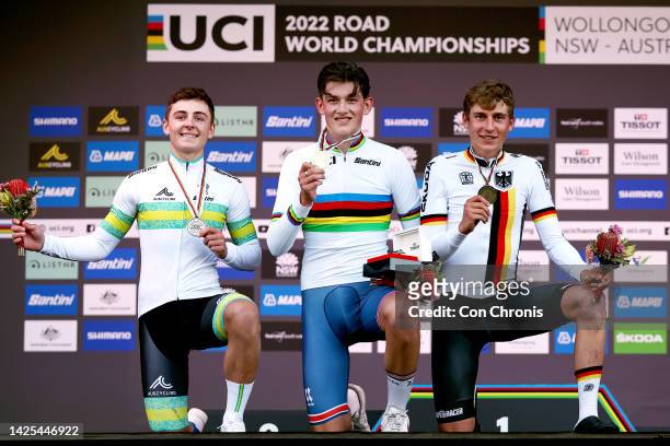 Silver medalists Hamish Mckenzie of Australia, gold medalists Joshua Tarling of United Kingdom, and bronze medalists Emil Herzog of Germany, pose on...
