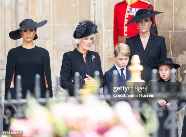 Meghan, Duchess of Sussex, Camilla, Queen Consort, Prince George of Wales, Catherine, Princess of Wales, Princess Charlotte of Wales during the State...