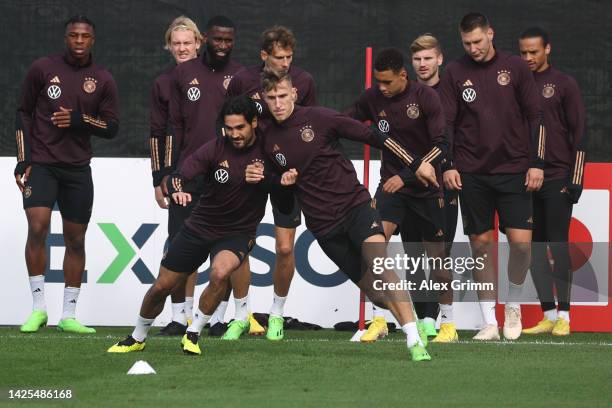 Ilkay Guendogan, Nico Schlotterbeck and teammates attend a Germany training session at DFB-Campus on September 20, 2022 in Frankfurt am Main, Germany.