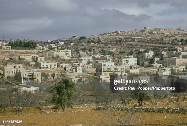 Buildings surrounded by olive groves in the town of Hebron in Israel in March 1969. Hebron was occupied by Israel during the 1967 Six-Day War and is...