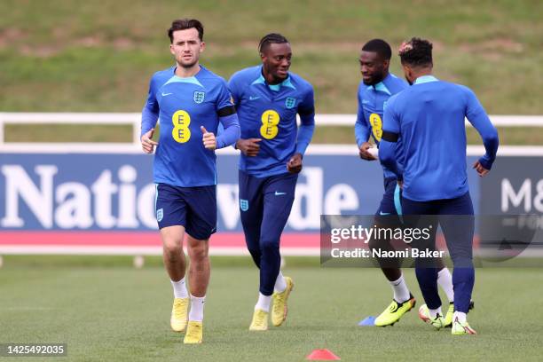 Ben Chilwell, Tammy Abraham, Fikayo Tomori and Reece James of England take part in a training session at St George's Park on September 20, 2022 in...
