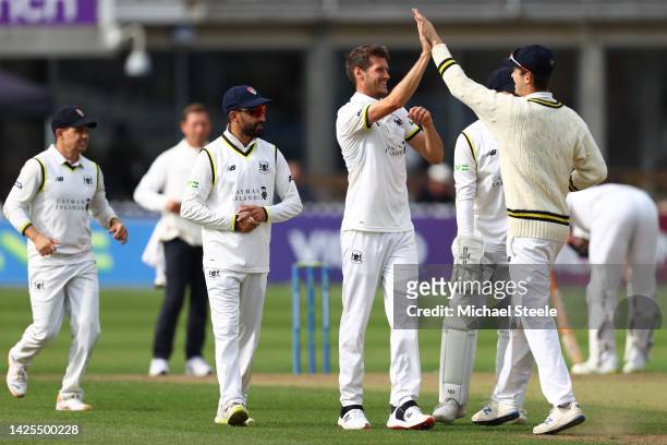 David Payne of Gloucestershire celebrates capturing the wicket of Alex Davies of Warwickshire during day one of the LV=Insurance County Championship...