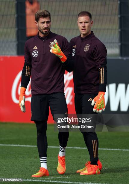 Goalkeepers Kevin Trapp and Marc-Andre ter Stegen react during a Germany training session at DFB-Campus on September 20, 2022 in Frankfurt am Main,...