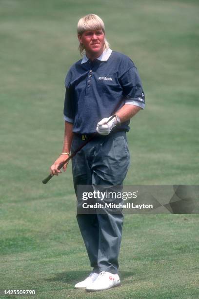 American golfer John daly looks on between shot during the day one of the Kemper Open at TPC Avenal on May 31, 1990 in Potomac, Maryland.