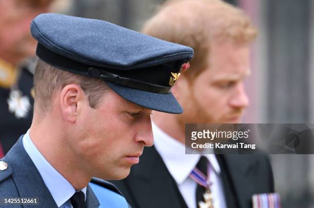 Prince William, Prince of Wales and Prince Harry, Duke of Sussex during the State Funeral of Queen Elizabeth II at Westminster Abbey on September 19,...