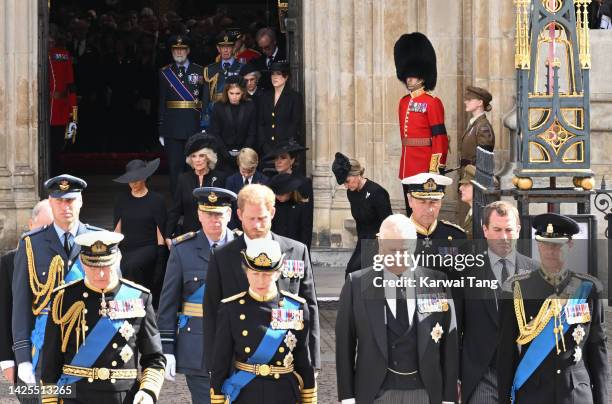 Members of the British Royal Family curtsy and bow to the coffin of Queen Elizabeth II outside Westminster Abbey. L-R Princess Beatrice, Birgitte,...