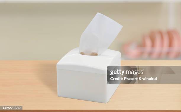 box of napkins or tissue box on table - tissue box stockfoto's en -beelden