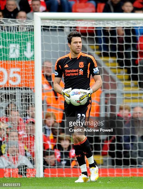 Doni of Liverpool in action during the Barclays Premier League match between Liverpool and Aston Villa at Anfield on April 7, 2012 in Liverpool,...