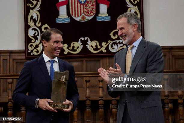 King Felipe VI presents the 'Camino Real Award' to tennis player Rafael Nadal , during its fifth edition, at the auditorium of the University of...