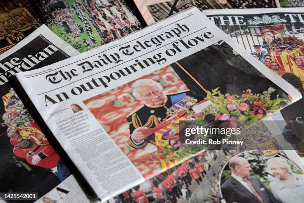 In this photo illustration coverage of the State Funeral of Queen Elizabeth II is seen on the front page of Britain’s The Daily Telegraph newspaper...