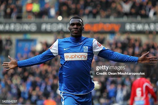 Christian Benteke of Genk celebrates scoring the second goal of the game during the Jupiler League match between KRC Genk and KAA Gent at the Cristal...