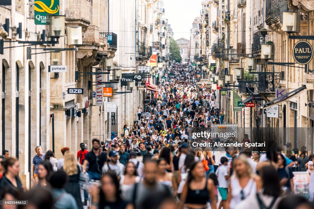 Crowds of people on rue Sainte-Catherine shopping street in Bordeaux, France