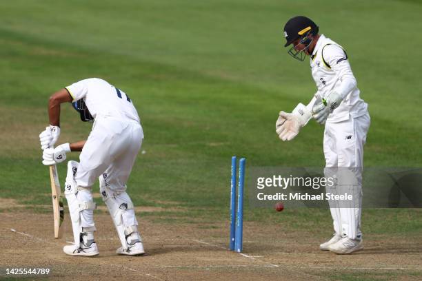 Jayant Yadav of Warwickshire is bowled by Zafar Gohar of Gloucestershire as wicketkeeper James Bracey looks on during day one of the LV=Insurance...