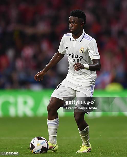 Vinicius Junior of Real Madrid controls the ball during the LaLiga Santander match between Atletico de Madrid and Real Madrid CF at Civitas...