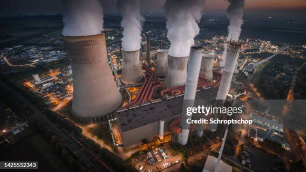 aerial view of modern coal fired power station - air pollution stock pictures, royalty-free photos & images