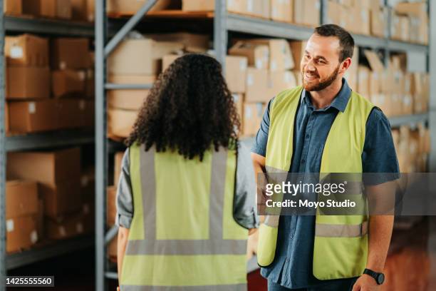 warehouse handshake, shipping deal and partnership in logistics factory, manufacturing and export industry. distribution workers shaking hands for b2b agreement, meeting contract and teamwork sales - contract manufacturing stock pictures, royalty-free photos & images