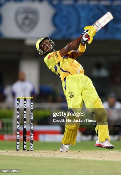 Chennai Super Kings batsman Dwayne Bravo plays a shot during DLF IPL Indian Premier league 2012 cricket match between Chennai Super Kings and Deccan...