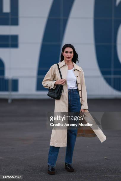 Brittany Xavier seen wearing jeans and a beige coat, outside Tory Burch Show during New York Fashion Week on September 13, 2022 in New York City.