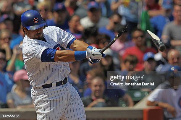 Geovany Soto of the Chicago Cubs breaks his bat hitting a single in the 4th inning against the Washington Nationals at Wrigley Field on April 7, 2012...