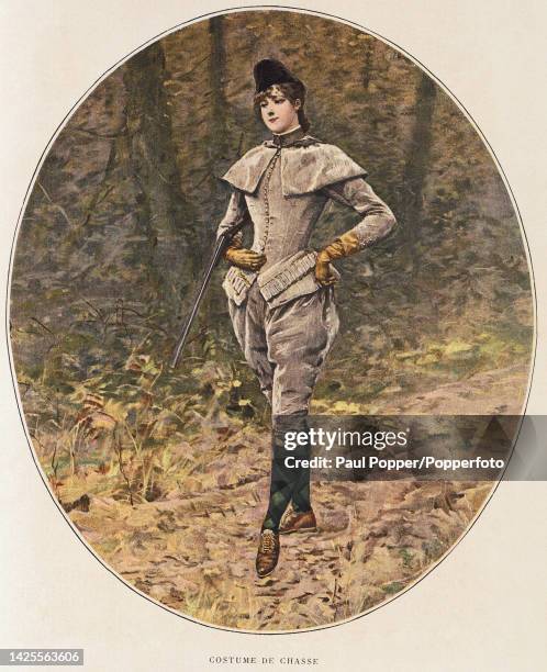 Colour plate from Les Modes showing a young woman wearing a buff coloured velvet hunting suit, comprising a tightly buttoned jacket with pleated...