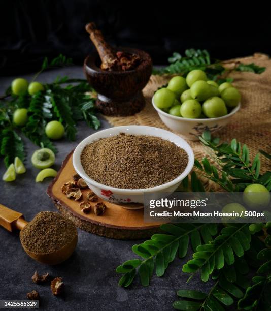 high angle view of ingredients on table - ashwagandha stockfoto's en -beelden