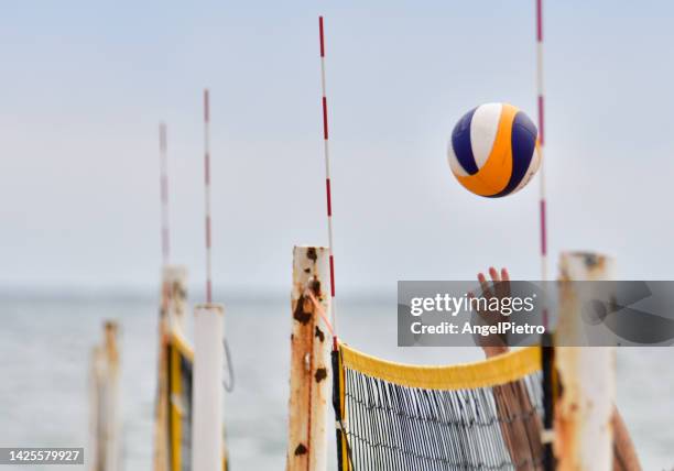 beach volley - beachvolleyball stock pictures, royalty-free photos & images