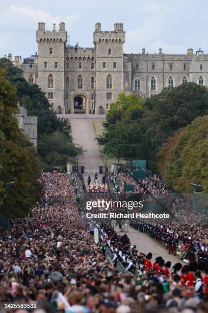 The coffin of Queen Elizabeth II is carried in the Royal State Hearse as it proceeds along The Long Walk towards St George's Chapel for The Committal...