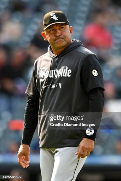 Acting manager Miguel Cairo of the Chicago White Sox walks off the field after making a pitching change during the seventh inning against the...