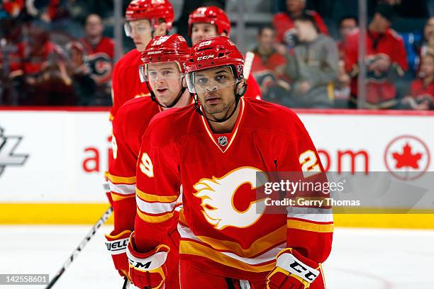 Akim Aliu of the Calgary Flames skates to the bench after socring his first NHL goal against the Anaheim Ducks on April 7, 2012 at the Scotiabank...