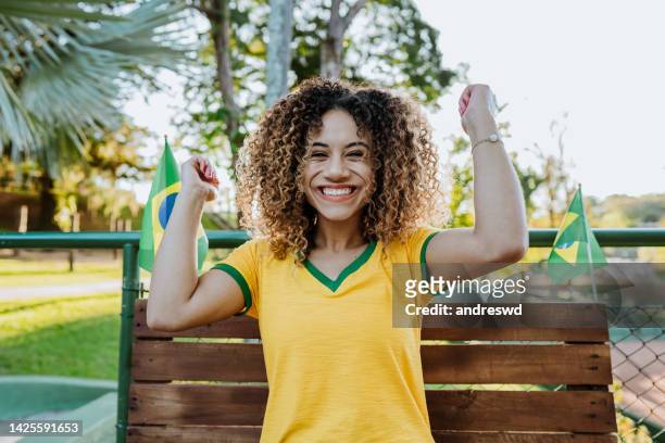 brazilian soccer fans - female football fans stock pictures, royalty-free photos & images