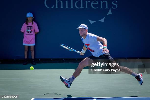 James Duckworth of Australia returns a shot against Alexei Popyrin of Australia on Day One of the San Diego Open at Barnes Tennis Center on September...