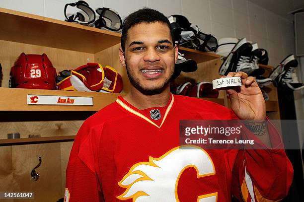 Akim Aliu of the Calgary Flames celebrates his first NHL goal after the game against the Anaheim Ducks on April 7, 2012 at the Scotiabank Saddledome...