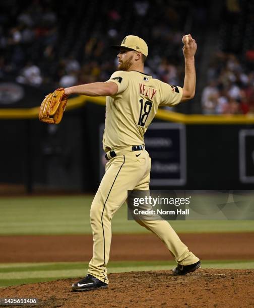 Carson Kelly of the Arizona Diamondbacks delivers a pitch against the San Diego Padres at Chase Field on September 16, 2022 in Phoenix, Arizona.