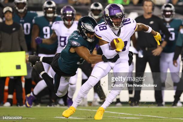 Edwards of the Philadelphia Eagles tackles Justin Jefferson of the Minnesota Vikings at Lincoln Financial Field on September 19, 2022 in...