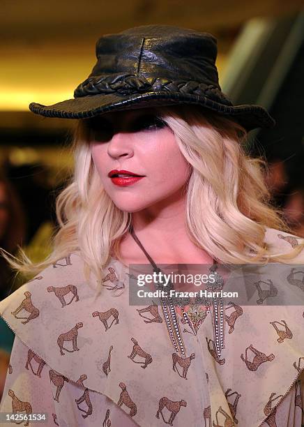 Model walks the runway at the Steven Tyler & Andy Hilfiger Host Andrew Charles' Fashion Show at Macy's Sherman Oaks on April 7, 2012 in Sherman Oaks,...