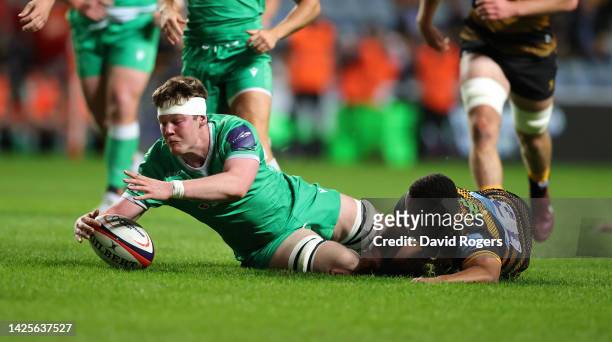 Matt Deehan of Newcastle Falcons is tackled by Will Simonds during the Premiership Rugby Cup match between Wasps and Newcastle Falcons at The...