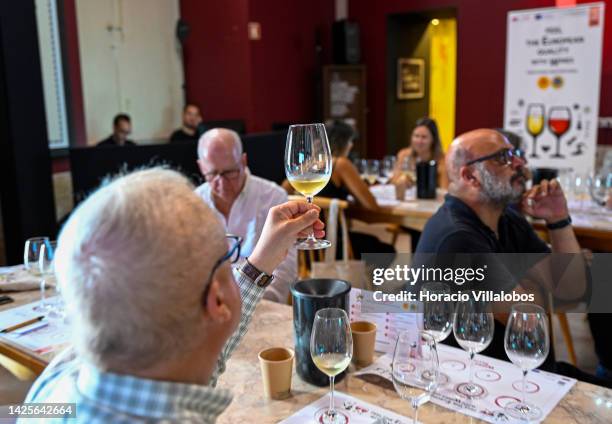 Participants try different wines during a presentation to the press of the new European campaign of Wines of Spain and Portugal by ViniPortugal in...