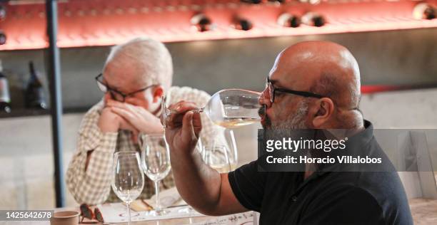 Participants try different wines during a presentation to the press of the new European campaign of Wines of Spain and Portugal by ViniPortugal in...