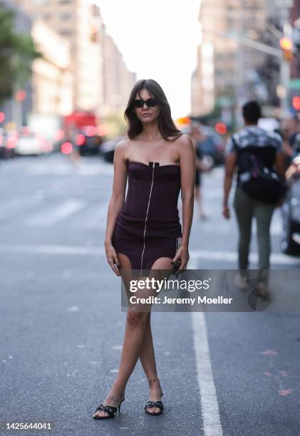 Fashion Week Guest seen wearing a a Dion Lee dress and black shoes outside Dion Lee, during New York Fashion Week on September 10, 2022 in New York...