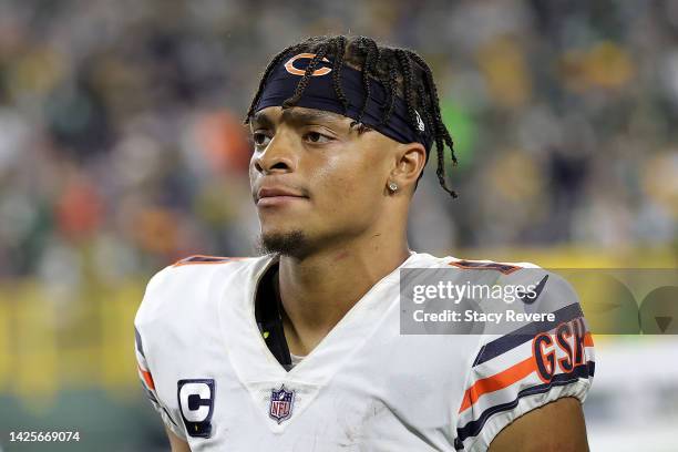 Justin Fields of the Chicago Bears leaves the field following a game against the Green Bay Packers at Lambeau Field on September 18, 2022 in Green...